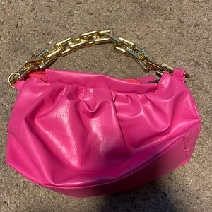 It’s nice pink handbag. Comes without box and tags